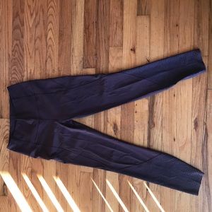 purple lulu lemon leggings with cute detailing
